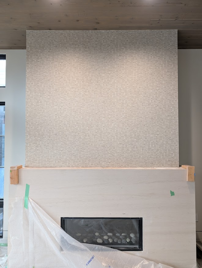 Fireplace surround grasscloth installation